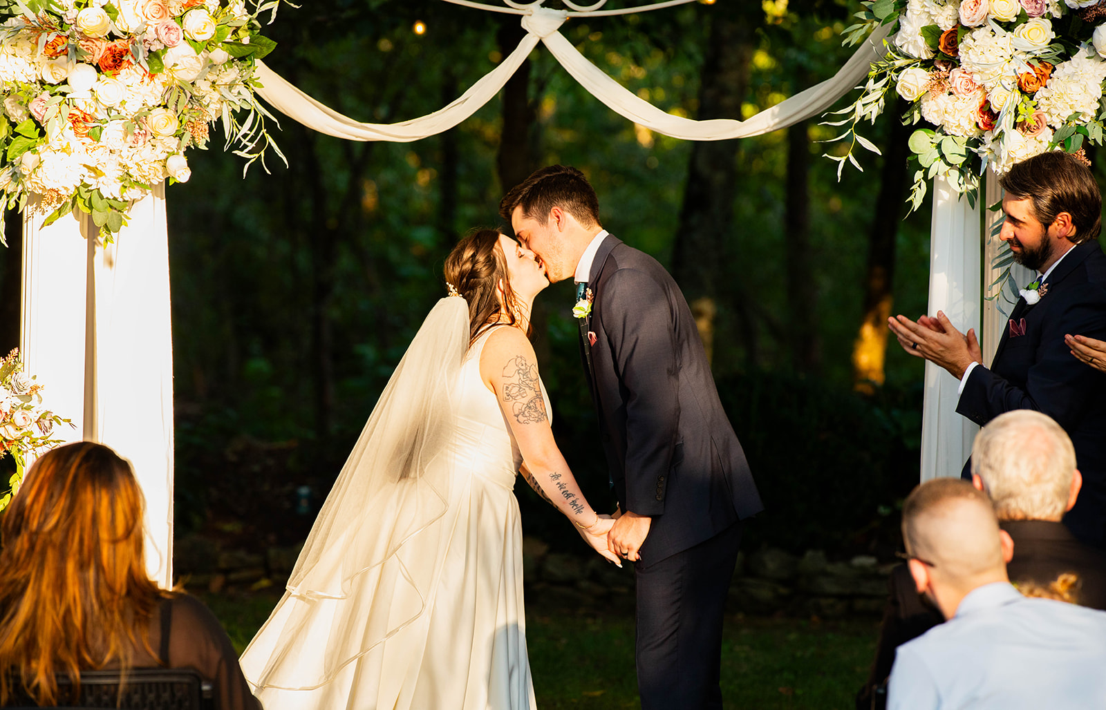 bride and groom's first kiss