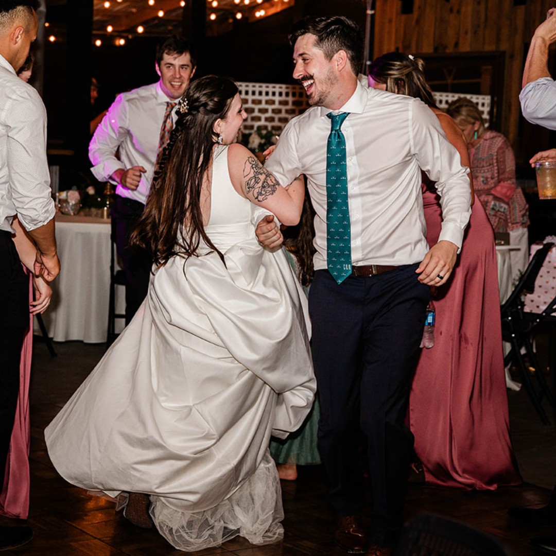 bride and groom dancing at reception