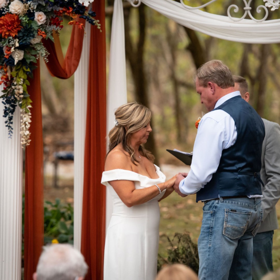 bride and groom saying vows