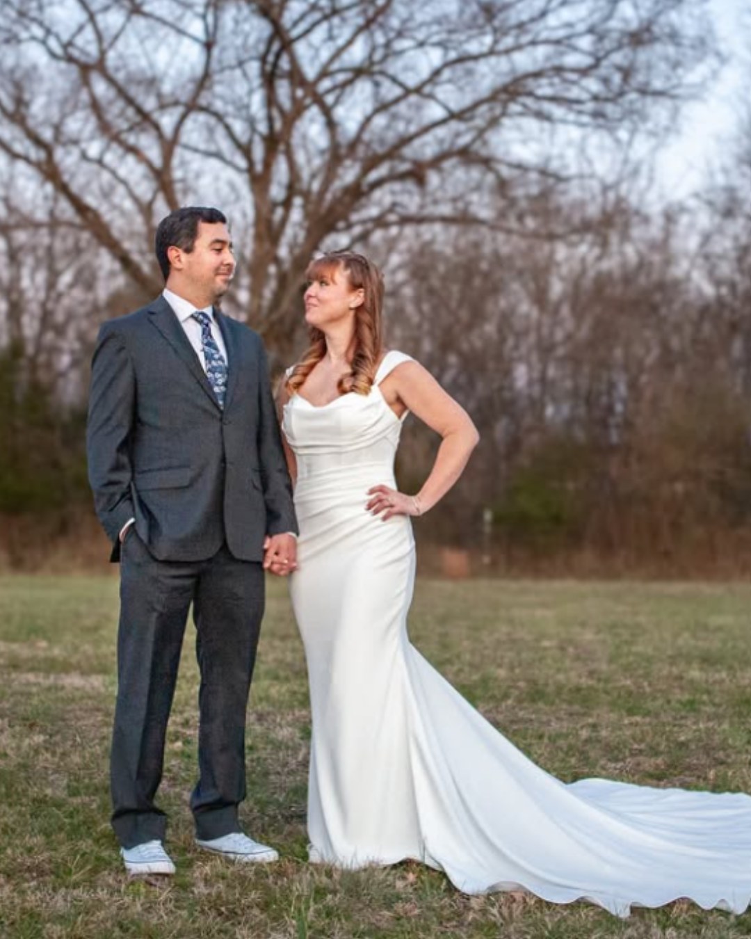 bride and groom holding hands